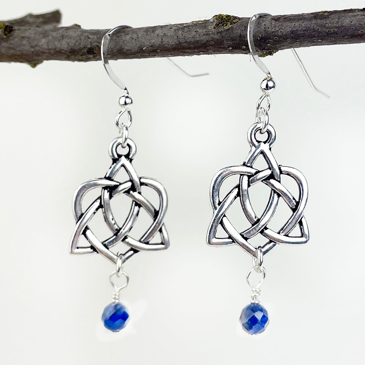 Sapphire with Celtic Trinity knot with Intwined Heart