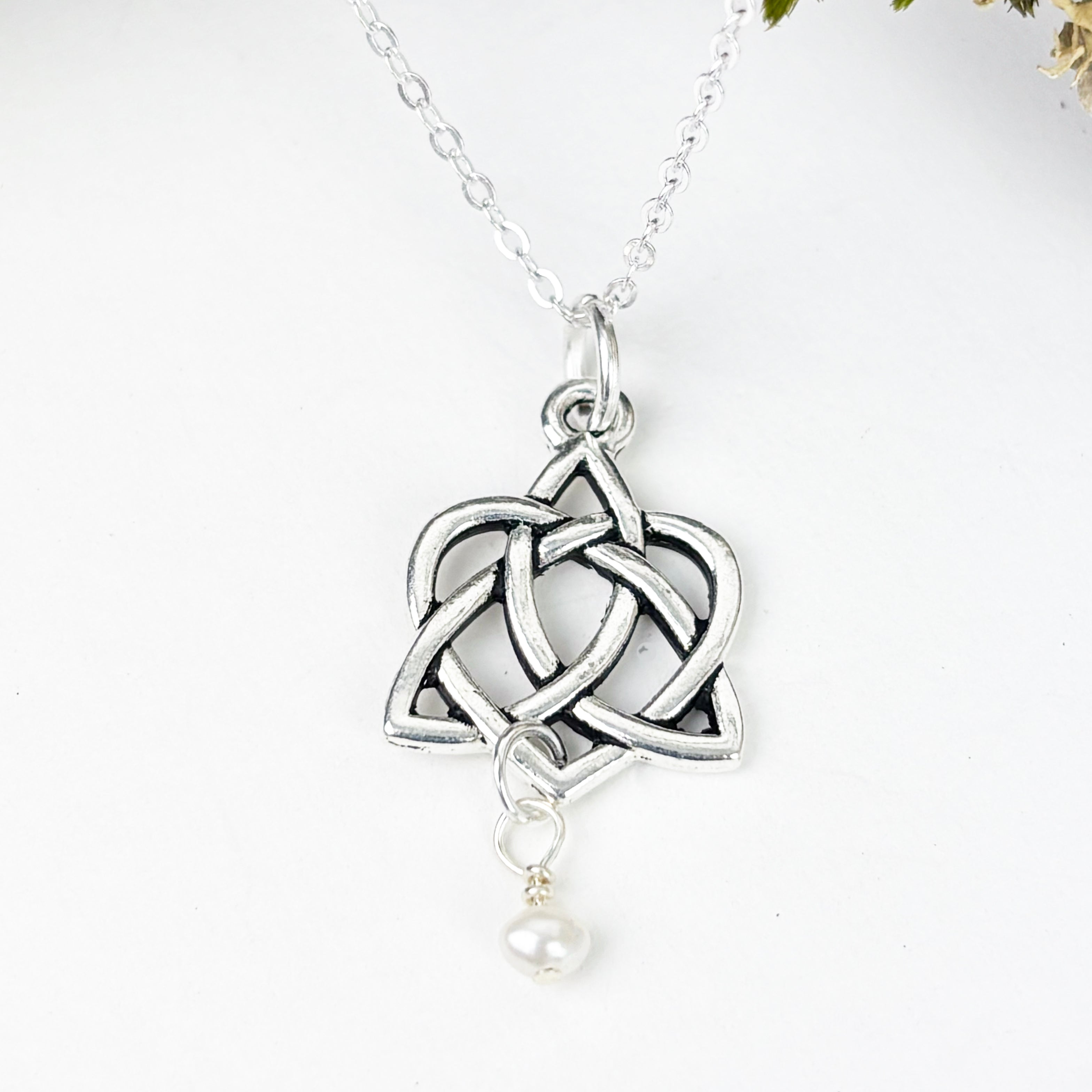 Freshwater Pearls with the Trinity Knot with intertwined heart.
