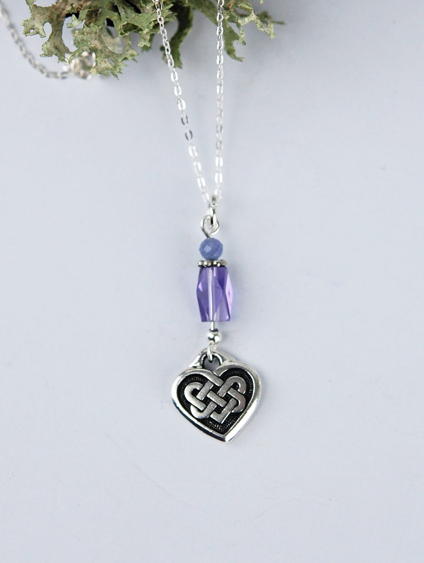Tanzanite Gemstone with Faceted Chamber and Celtic Heart Knot