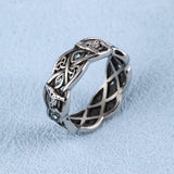 Open Celtic Knot with Faceted Teal Glass Stones Band