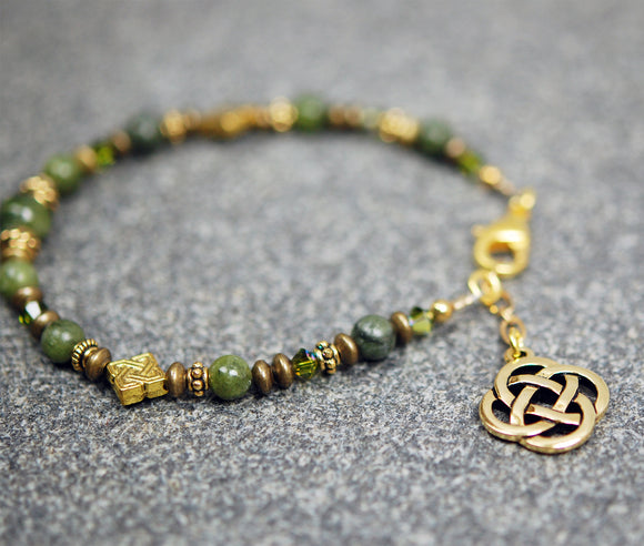 CONN-809-GP  Connemara Marble Bracelet with Gold Details with Celtic Knot Drop